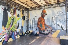 Music-Themed Mural of Guitarist and DJ by Cedar Creative Art